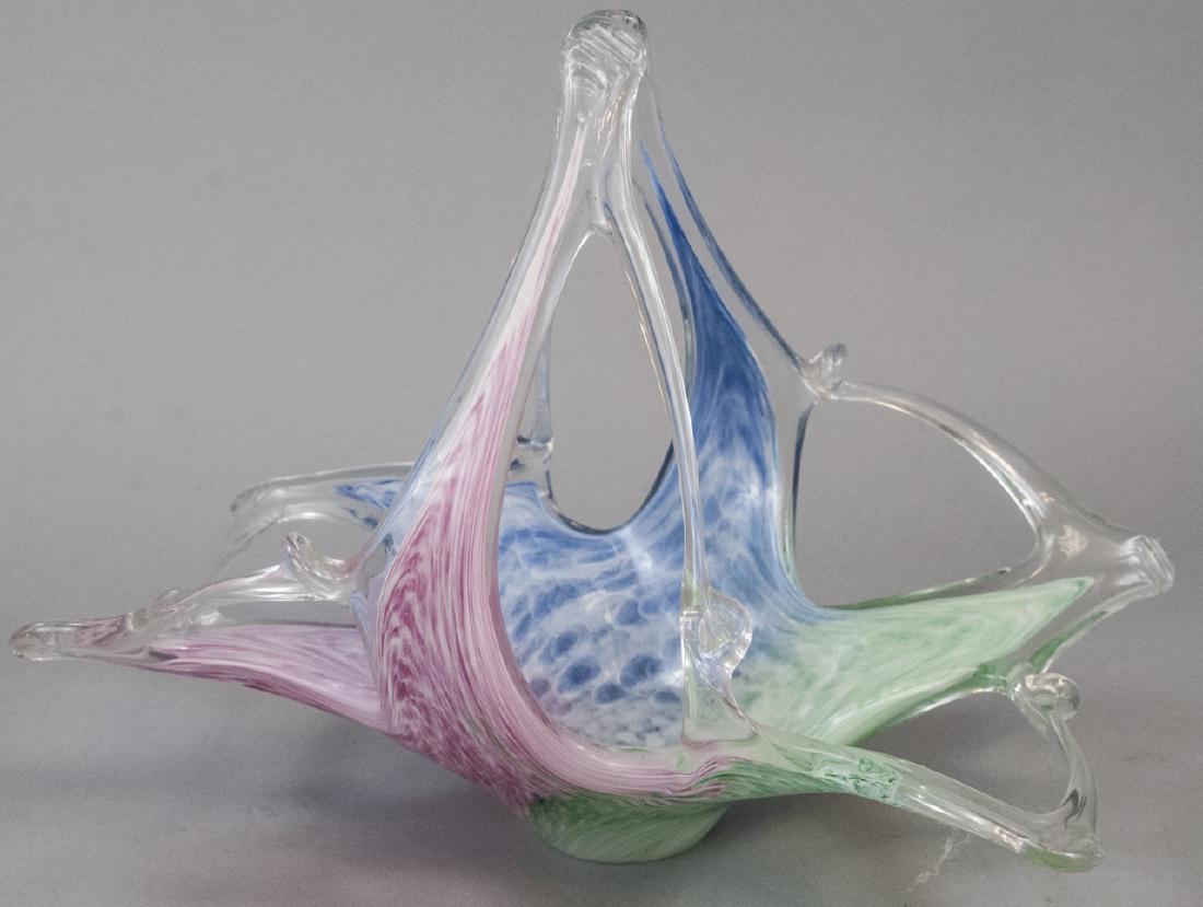 Multicolored Fenton Art Glass Centerpiece: Multicolored Fenton Art Glass Centerpiece, this piece of glass features pink, blue, and green glass, in a bowl shape with excess glass on the ends, the piece is measured at 12 x 14.5 x 9.5 inches