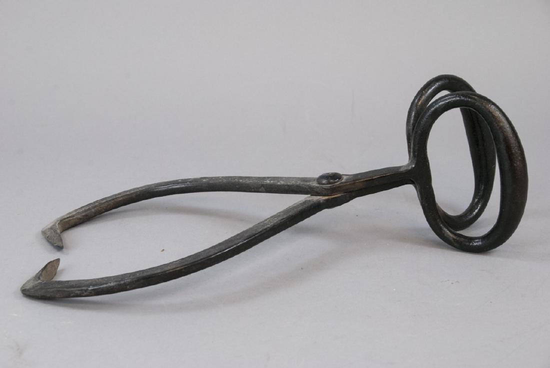 Antique Black Cast Iron Ice Tongs: Antique Black Cast Iron Ice Tongs, these ice tongues are made out of cast iron with black paint and is measured at 5 x 41.5 inches