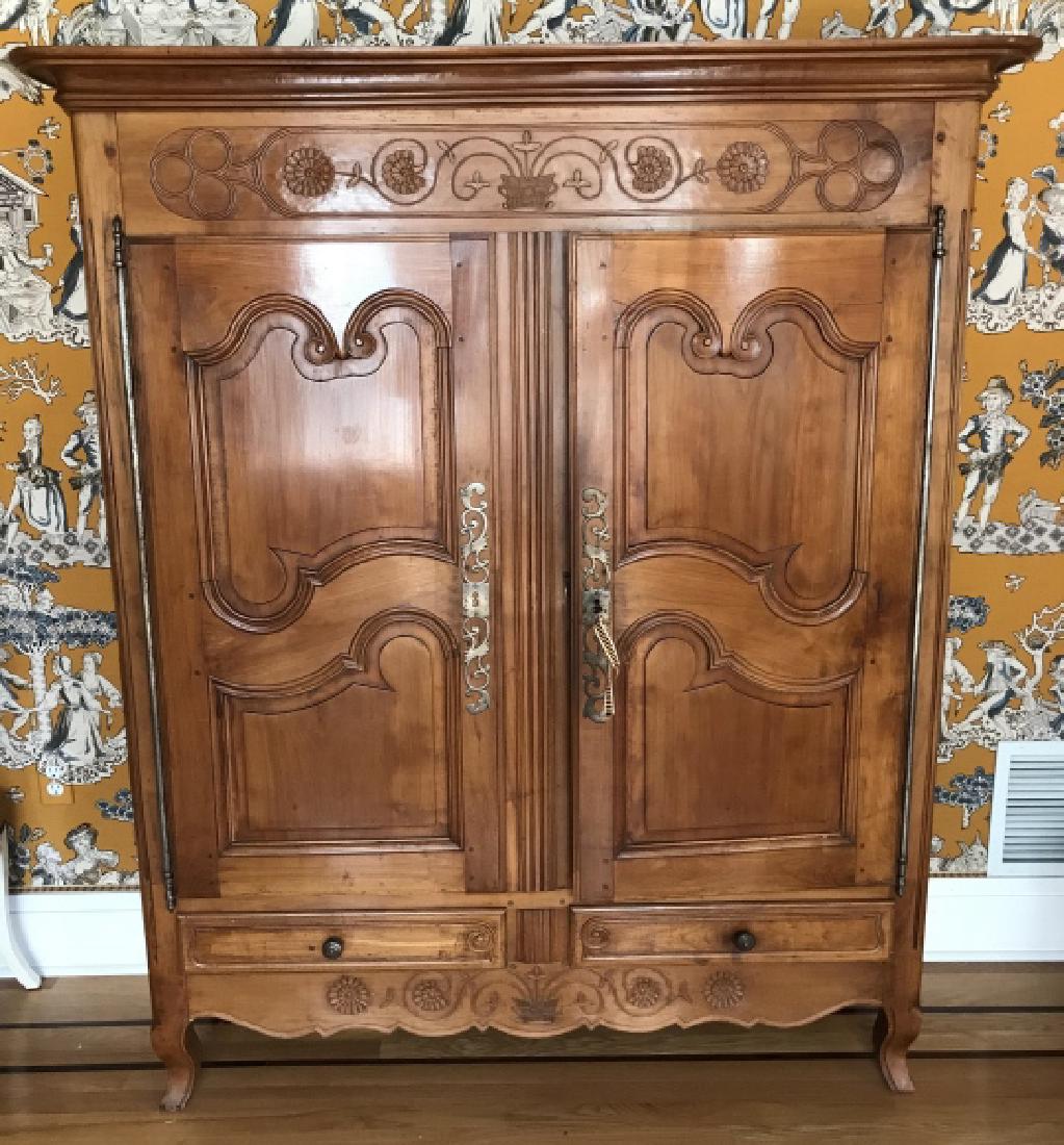 Antique French Provencal Armoire Fitted as Bar: Antique French Provencal Armoire Fitted as Bar. Antique 19th century French country armoire that has been custom finished on the inside with designer fabric, drawers and glass to be used as a bar. Mea