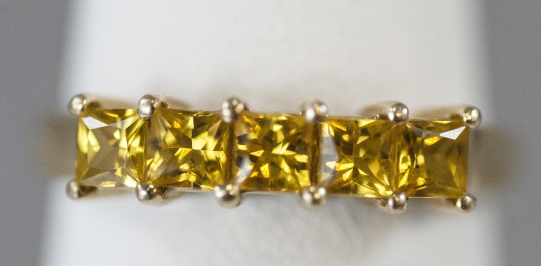 Estate 14kt Yellow Gold Band / Ring: Estate 14kt Yellow Gold Band / Ring. Great for stacking. Set with yellow stones. Ring size 6.5 can be resized