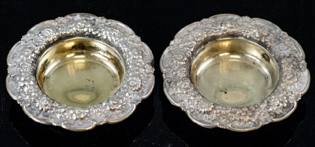 Pair Antique Tiffany & Co Sterling Silver Salts: Pair Antique Tiffany & Co Sterling Silver Salt Cellars. Gilt wash interior. Hallmarked / signed. Each measures nearly 2 inches in diameter.