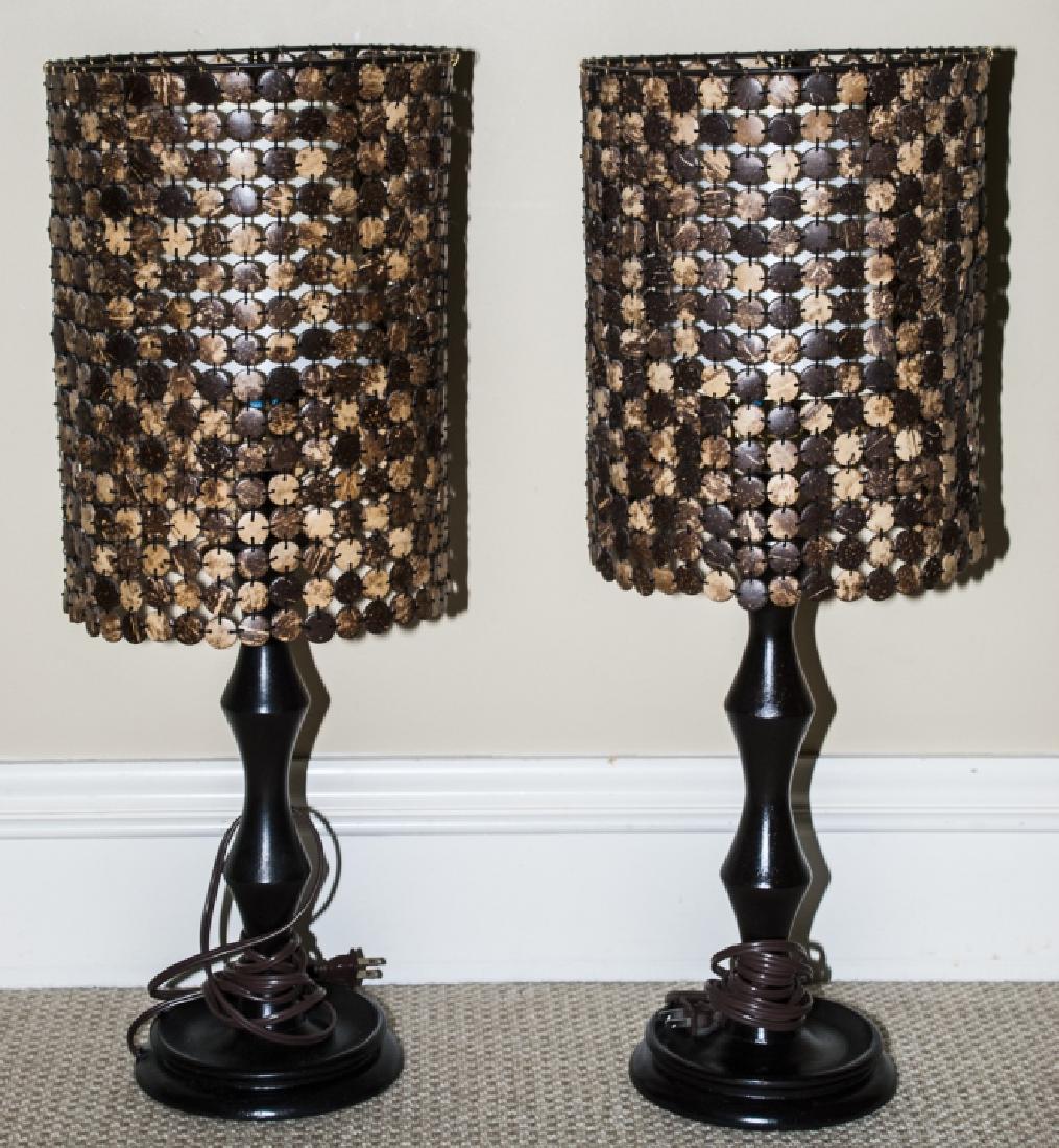 Pair Coconut Husk Shaded Wooden Lamps: Pair Coconut Husk Shaded Wooden Lamps. Shades are made of woven together disks made of coconut shells. 26.5 inches x 10 inches with shade.