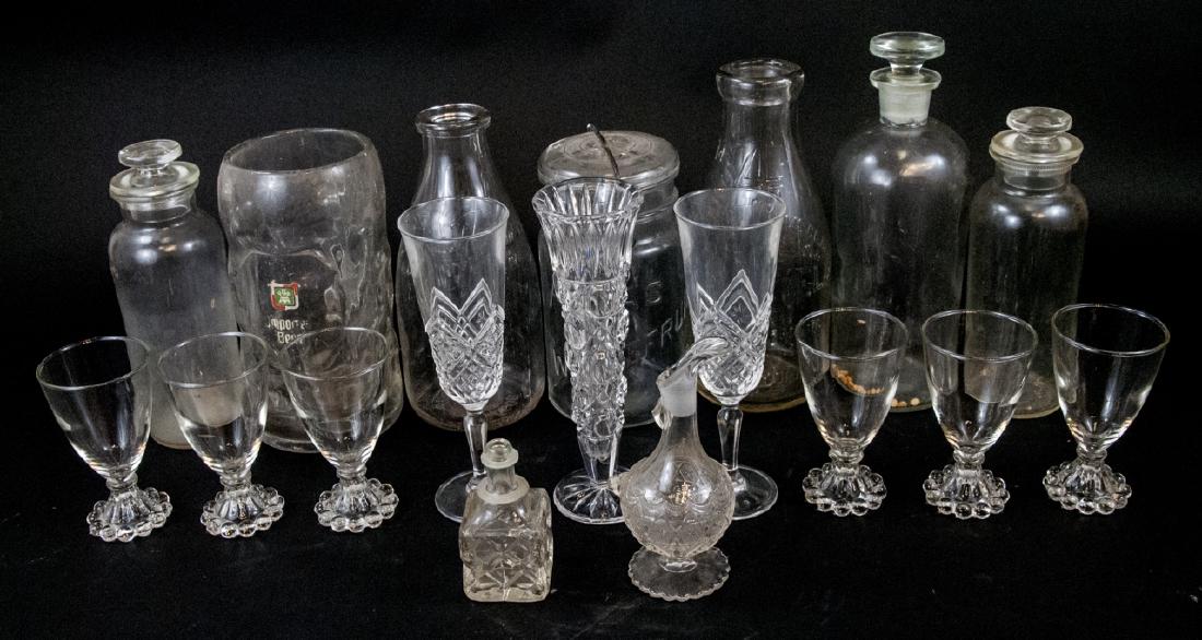 Assorted Lot Of Vintage Glass Items: Assorted Lot Of Vintage Glass Items, this lot features a variety of glass products including decanters, dispensers, perfume bottles, beer mugs, and wine glasses, the largest is measured at 9 x 7.5 x 4