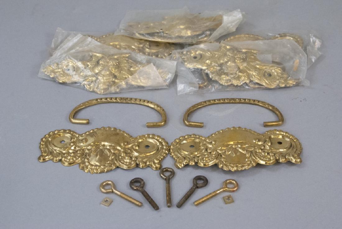 Ormolu Victorian Style Drawer Pulls w Devil Heads: Ormolu Victorian Style Drawer Pulls w Devil Heads & Floral Designs. Each measures 5 inches in width.