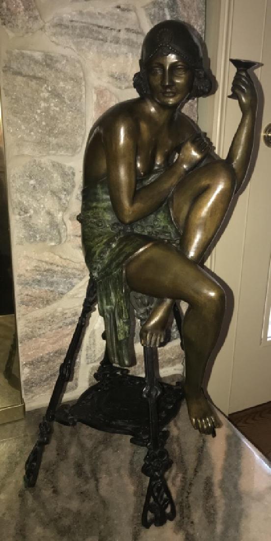 Bronze Statue of a Seated Lady Signed Luca: Bronze Statue of a Seated Lady Signed Luca. Sculpture of a semi nude woman seated on stool. Made after the original by the Italian artist, Ferdiando De Luca. Measures 29 x 11.5 x 11.5 inches. From a c