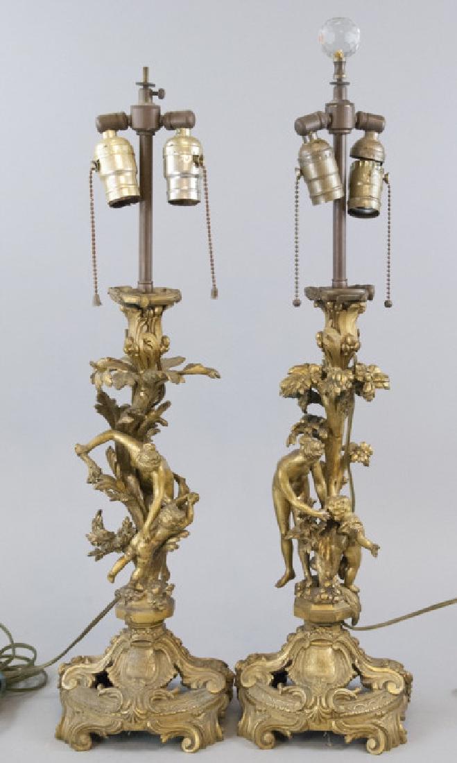 Pair of Antique Gilt Bronze Ormolu Nude Lamps: Pair of Antique Gilt Bronze Ormolu Nude Lamps. Figural lamps with nudes and putti. Each measures 28 inches in height.
