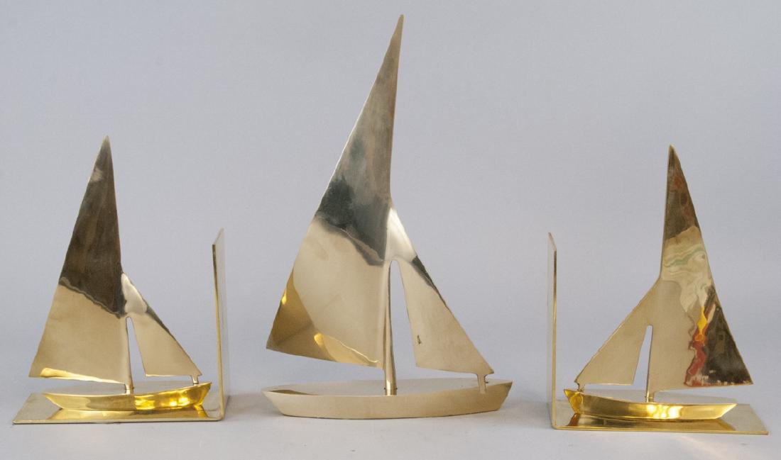 Vintage Gilt Brass Sail Boat Statue & Bookends: Vintage Gilt Brass Sail Boat Statue & Bookends. Statue measures 14.5 inches in height.