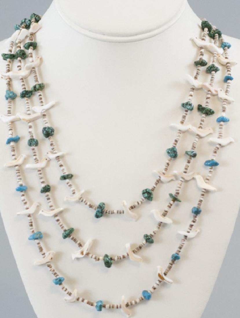 Vintage Native American 3 Strand Fetish Necklace: Vintage Native American 3 Strand Fetish Necklace. With birds. Carved shells and turquoise. Measures 27 inches at longest strand.