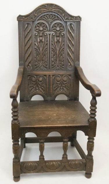 English Tudor Style Oak Carved Wainscot Chair English Tudor Style Oak Carved Wainscot Chair