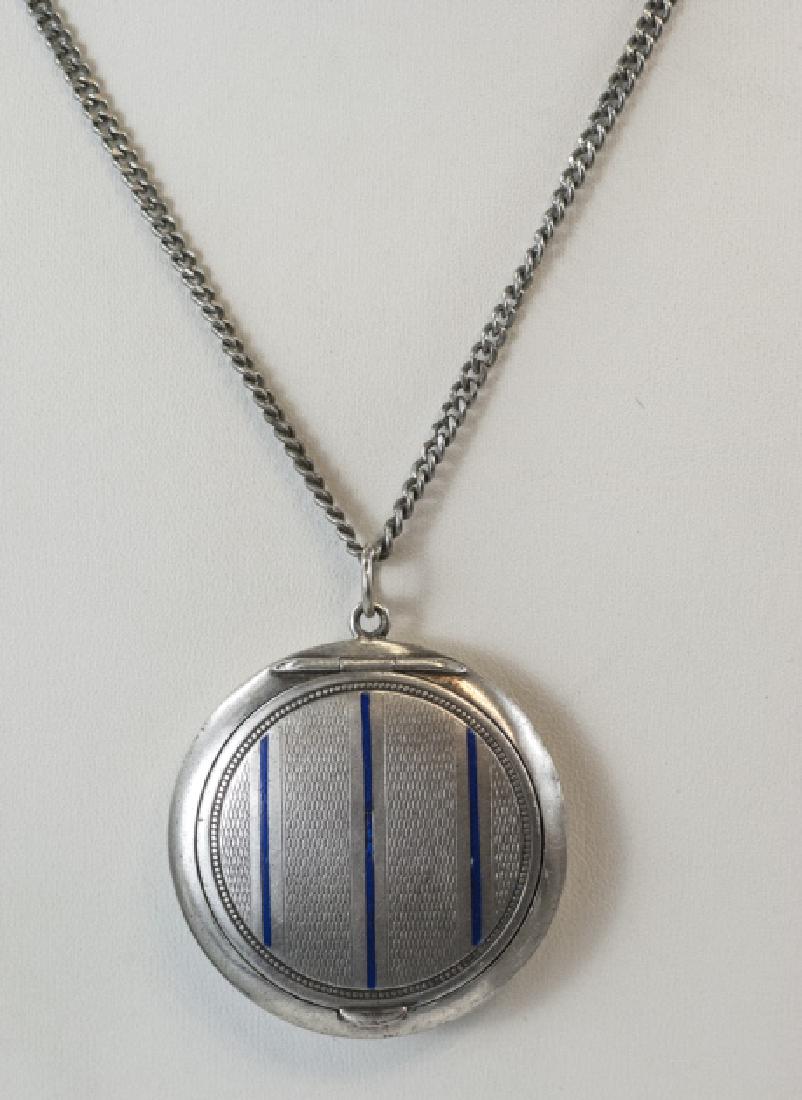 Antique Art Deco Sterling Silver & Enamel Locket: Antique Art Deco Sterling Silver & Enamel Locket Necklace Pendant on Silver Tone Chain. Sterling locket measures 2 inches in length, silver tone chain measures 25 inches in length.