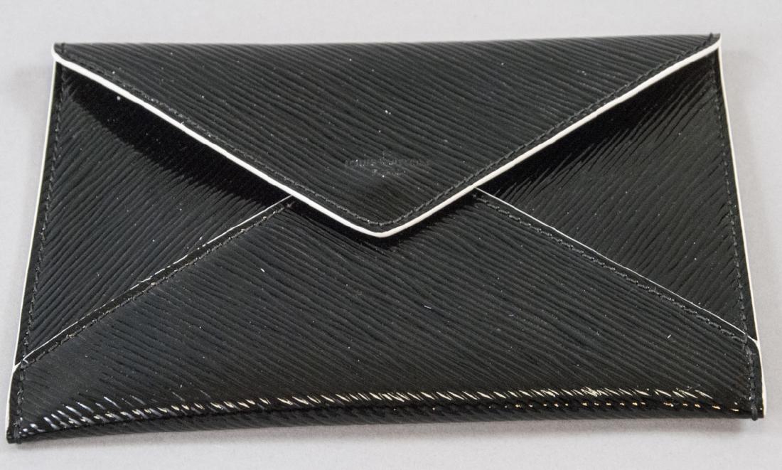 Louis Vuitton Paris Envelope Form Wallet: Louis Vuitton Paris Envelope Form Wallet. Measures 7 x 5 inches.