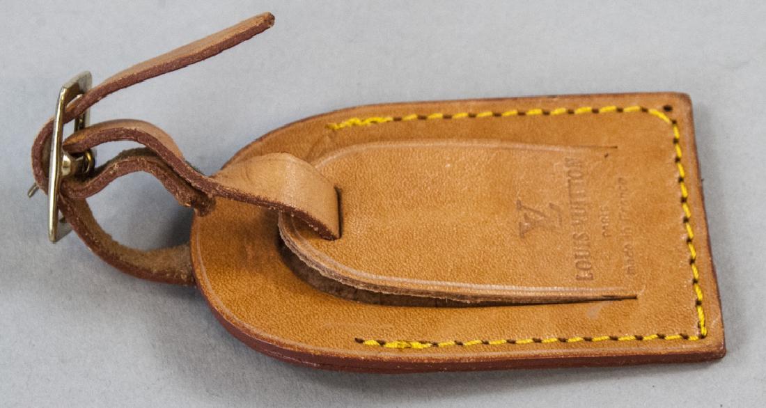 Vintage Louis Vuitton Brown Leather Luggage Tag: Vintage Louis Vuitton Brown Leather Luggage Tag. Measures 3.25 x 2 inches, plus strap.