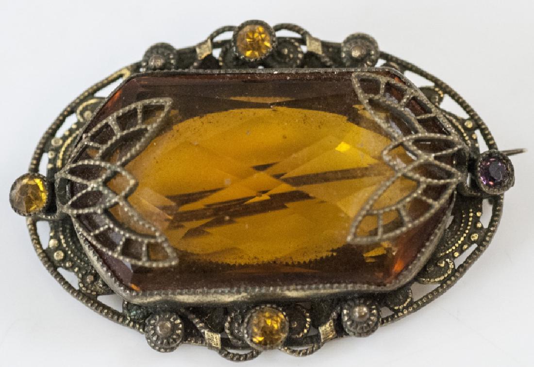 Antique Czech Glass / Crystal Amber Tone Brooch: Antique Czech Glass / Crystal Amber Tone Brooch. Measures 2 inches in width.