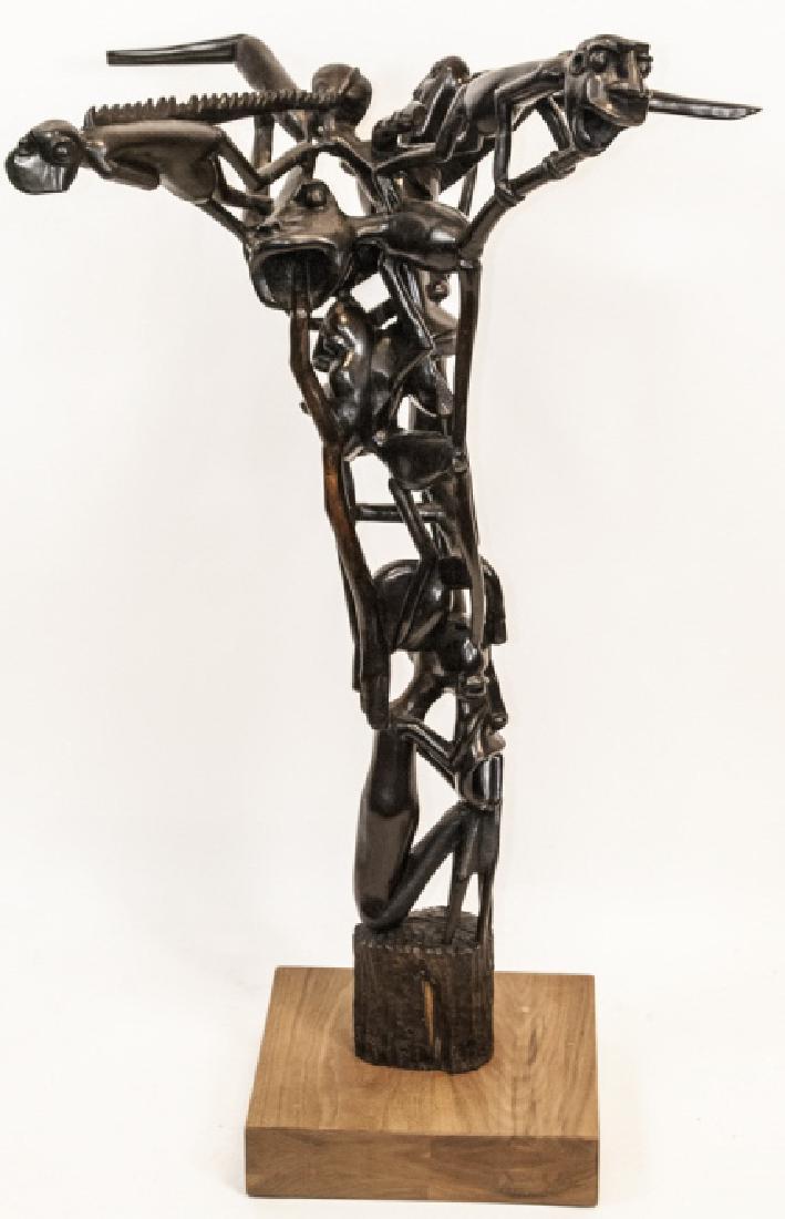African Tribal Modernist Carved Ebony Sculpture: African Tribal Modernist Carved Ebony Sculpture. This piece of African tribal art having a modernist form / style features abstracted human figures composing a tree form. Titled "The Tree of Life". On