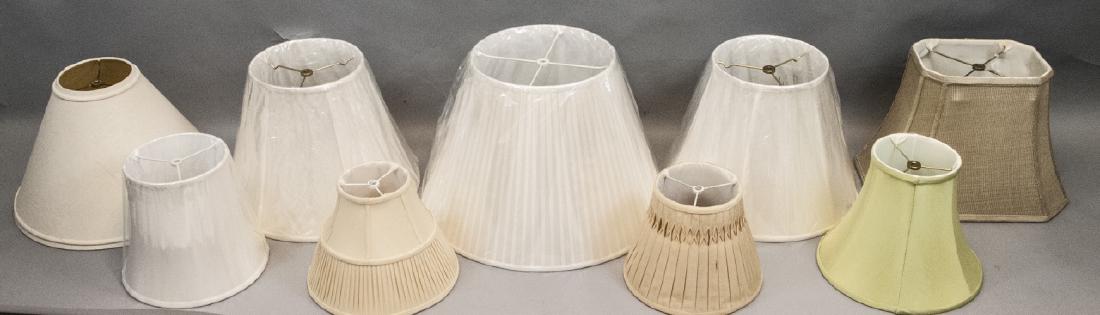Large Lot of New Lamp Shades: Large Lot of New Lamp Shades. Mixed makers, styles, materials, and sizes. Shades are mostly unused. Largest shade is 13 inches x 22 in diameter