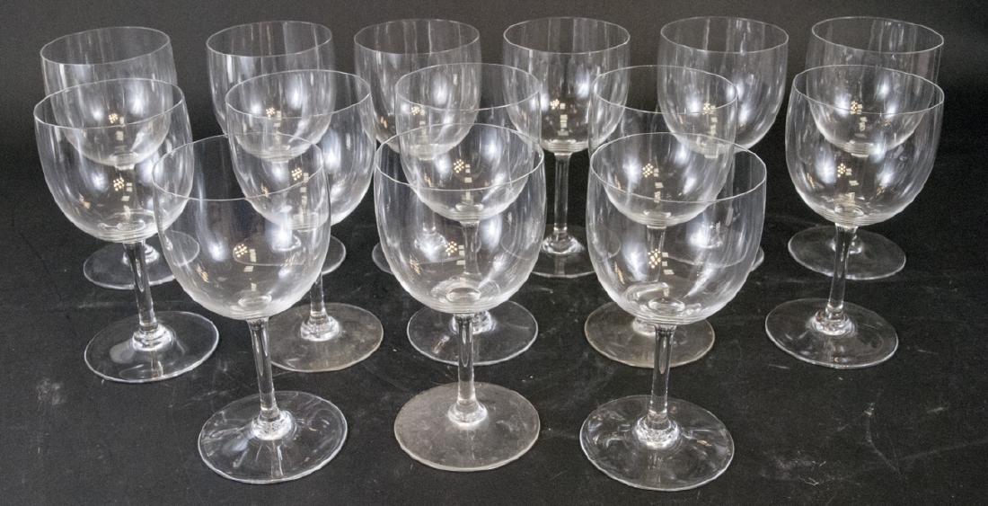 14 Baccarat Stemmed Wine Goblets: 14 Baccarat Stemmed Wine Goblets. Each piece is marked Baccarat on the bottom. Each measures approximately 7 inches x 3.65 inches in diameter.