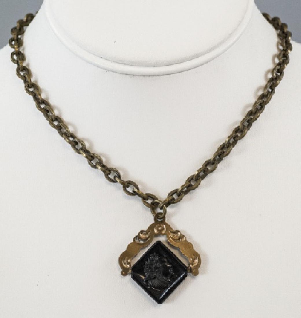 Antique 19th C Victorian Revolving Cameo Necklace: Antique 19th C Victorian Revolving Cameo Choker Necklace. Measures 14.25 inches in length.
