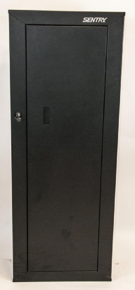 Sentry Metal Standing Rifle / Gun Safe: Sentry Metal Standing Rifle / Gun Safe. This standing rifle / fun safe by Sentry features a lock and key and holds up to eight rifles. 55 inches x 21 inches x 10 inches.