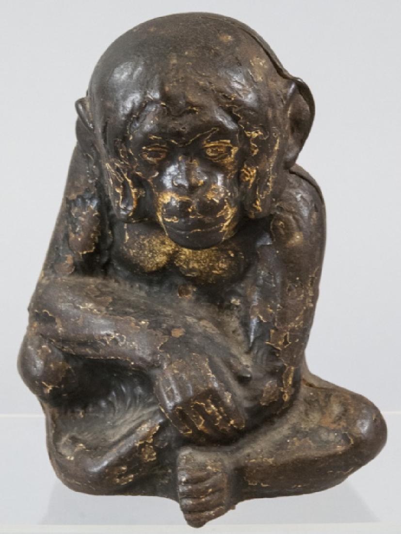 Vintage Cast Iron Chimpanzee Door Stop / Figurine: Vintage Cast Iron Chimpanzee Door Stop / Figurine. 7 inches x 5 inches