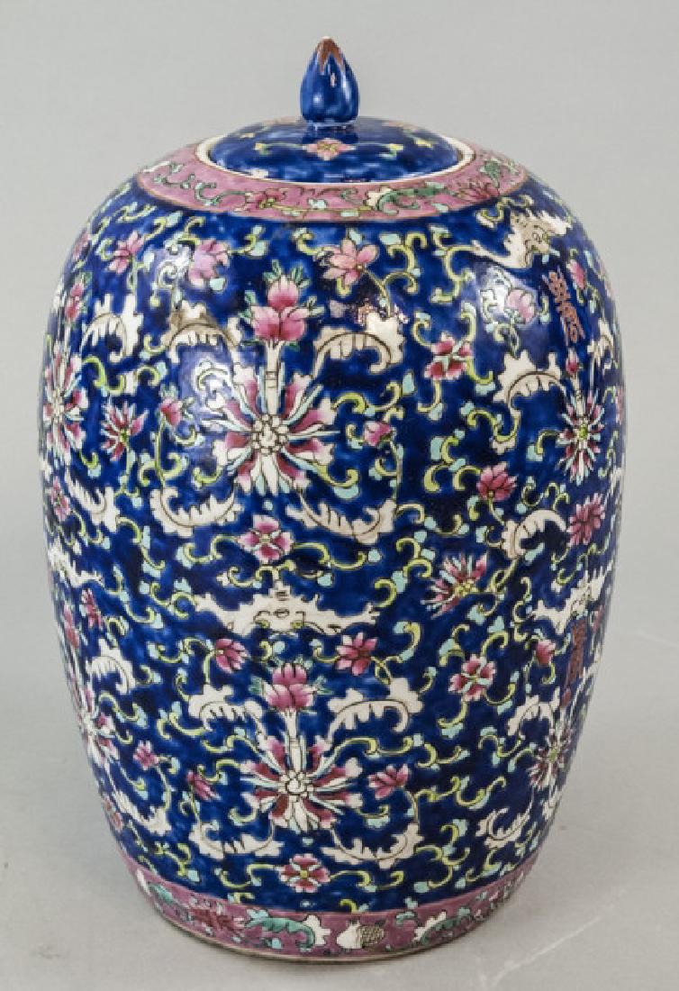 Chinese Hand Painted Floral & Bat Motif Porcelain: Chinese Hand Painted Floral & Bat Motif Porcelain Ginger Jar. Signed / stamped on bottom. Hand painted design of lotus flowers, scrolling vines and bats on blue background. Measures 13 inches in heigh