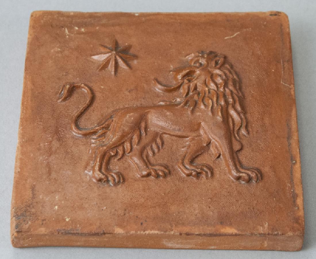 Antique Zodiac Leo Tile - Terracotta Tile w Lion: Antique Zodiac Leo Tile - Terracotta Tile w Lion. Measures 4 x 4 inches.