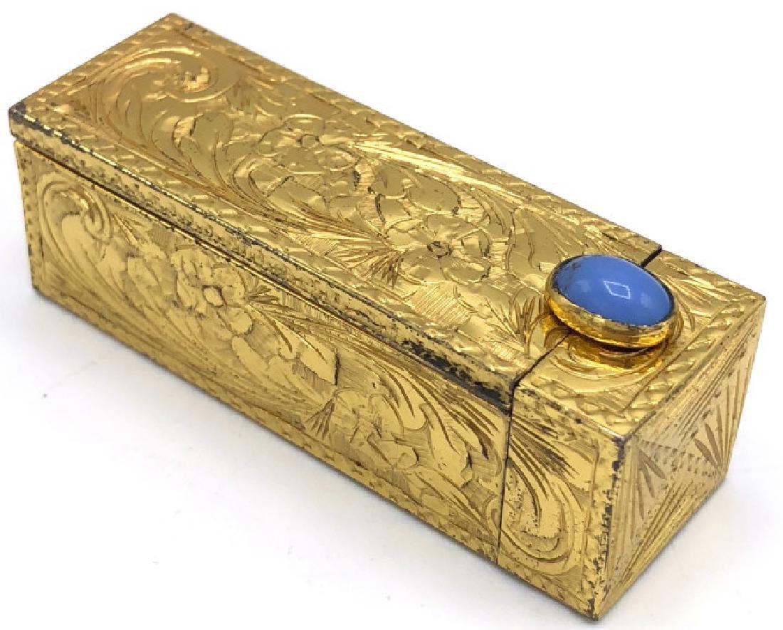 Gilt Silver Chased Lipstick Case: Gilt Silver Chased Lipstick Case. Heavily chased with floral decoration and Stone closure. Hallmarked for 800 silver and makers mark. Great mechanism that works perfectly. Includes mirror. Approximate
