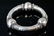 Two Silver Tone Bangle Bracelets - 4