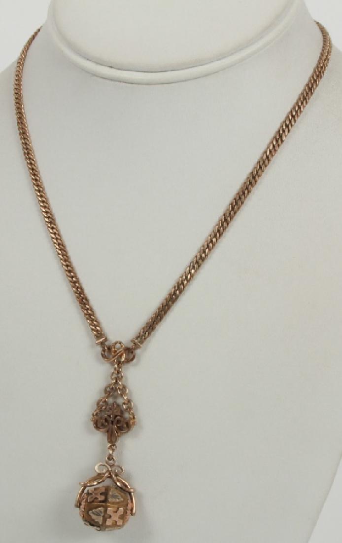Antique 19th C Gold Fill Necklace w Spinner Fob: Antique 19th C Gold Fill Necklace w Spinner Fob. Chain measures 15 inches, pendant measures 2 inches.