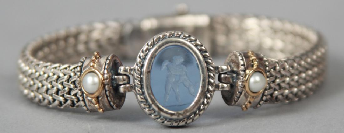 Flli Menegatti Sterling 18k Gold Intaglio Bracelet: Flli Menegatti Sterling 18k Gold Intaglio & Pearl Bracelet. Measures 7.5 inches in length. Intaglio of a cupid with dog. Weighs approximately 35 grams inclusive.