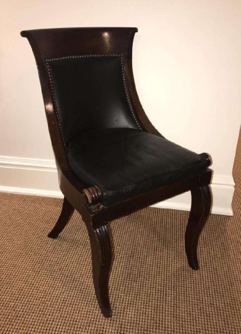 Antique Leather Biedermeier Carved Slipper Chair: Antique Leather Biedermeier / Napoleonic Style Carved Slipper Chair . With upholstery tack trim. Measures 32 x 18 x 20 inches. Property of a Cos Cob Greenwich, CT estate.