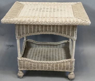 Vintage White Wicker Outdoor Coffee Table: Vintage White Wicker Outdoor Coffee Table. Featuring ball form feet and two tiers. 29 inches x 32 inches x 26 inches.