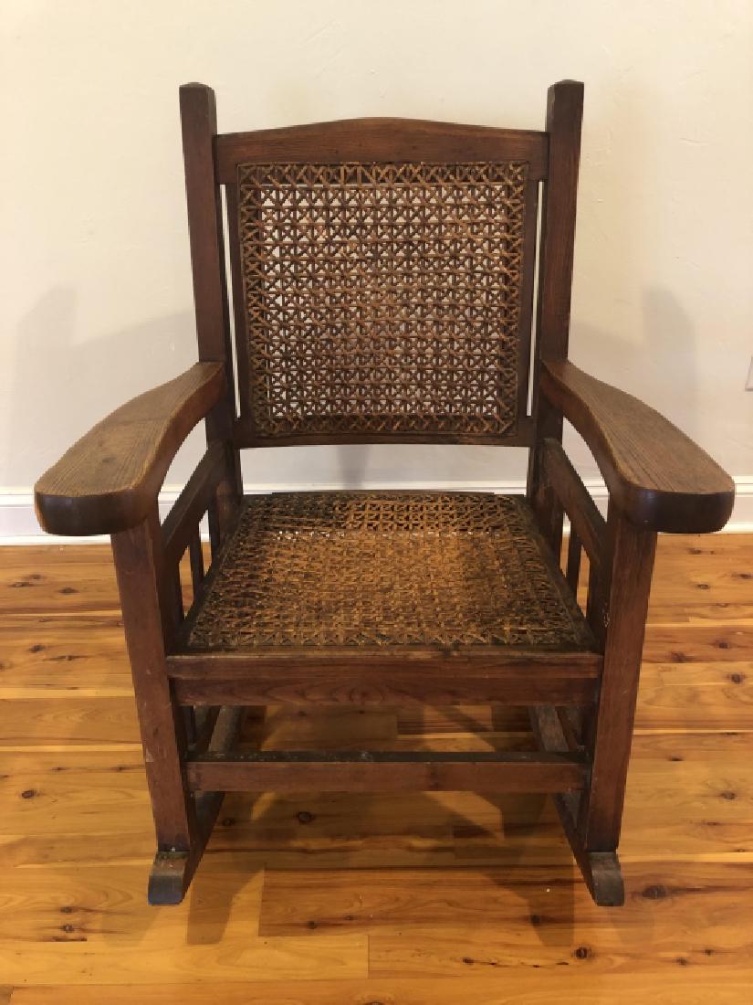Antique Mission Style Caned Rocker: Antique Mission Style Caned Rocker. 38 inches x 28 inches x 24 inches