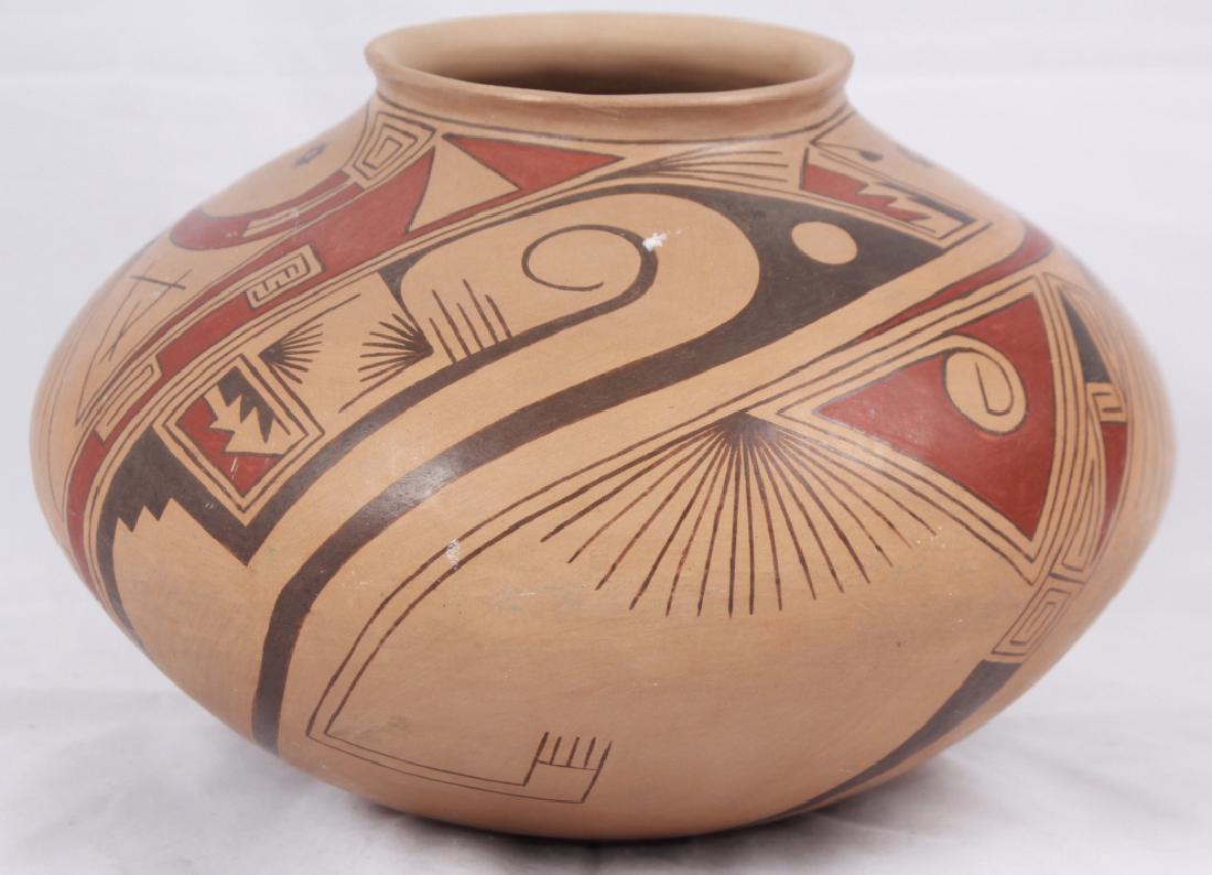 Nicholas Quezada Santa Fe Pottery Signed: Nicholas Quezada Santa Fe Pottery Signed. Santa Fe clay pottery signed by the artist Nicholas Quezada on bottom. 7 inches x 9 inches. Very Good condition.