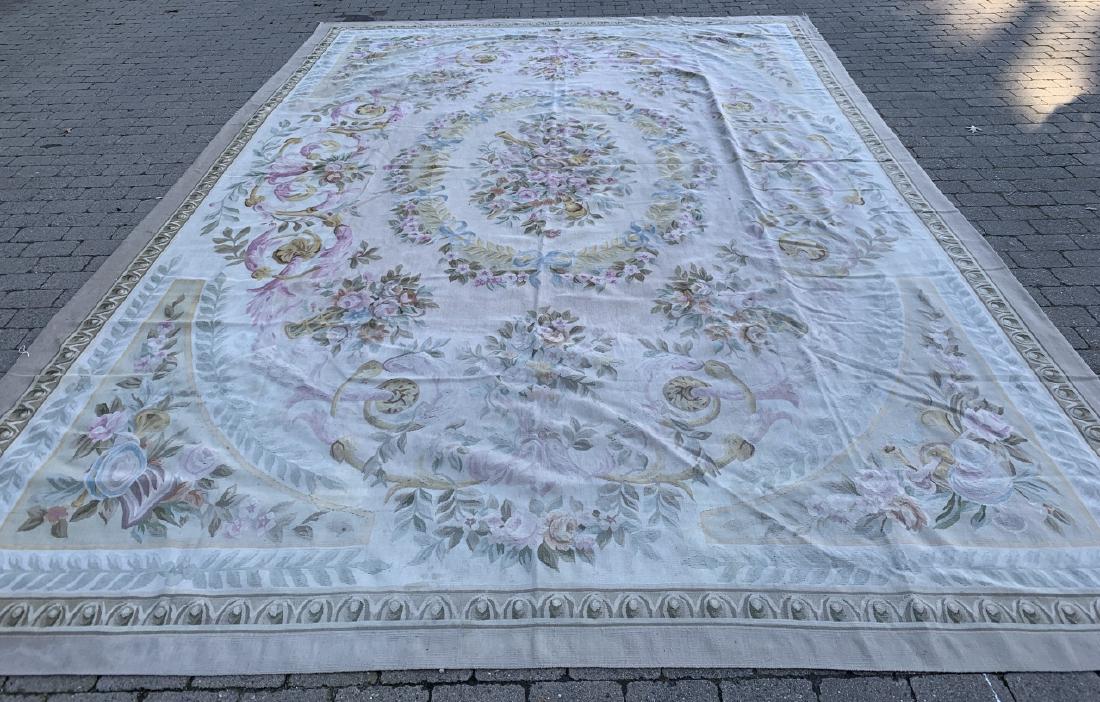 French Aubusson Floral Rug / Carpet: French Aubusson Floral Rug / Carpet. Having an all over floral and bow motif in pink, cream, and blue colorways. 170 inches x 116 inches.