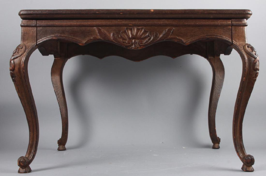 Chinoiserie Mirrored & Carved Coffee Table: Chinoiserie Mirrored & Carved Coffee Table. Features an etched mirrored table top with a motif of a woman holding a parasol. Carved apron and cabriole legs. 18 inches x 26 inches x 21 inches.