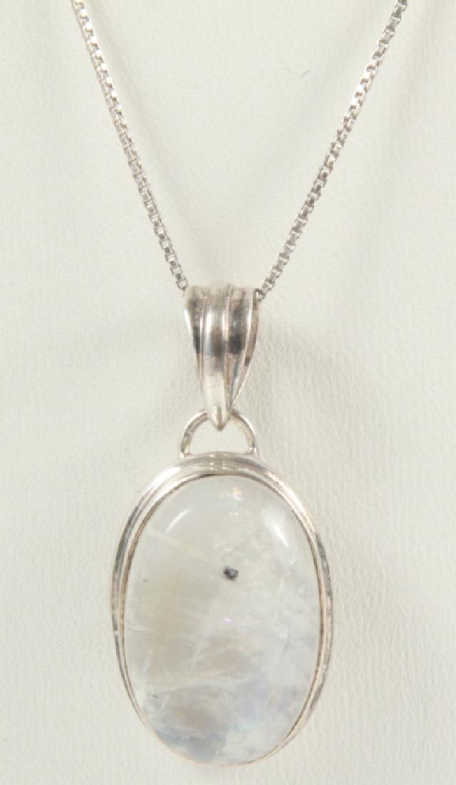 Vintage Sterling Silver & Moonstone Necklace: Vintage Sterling Silver & Moonstone Necklace. Oval cabochon moonstone pendant. Measures 24.75 inches.