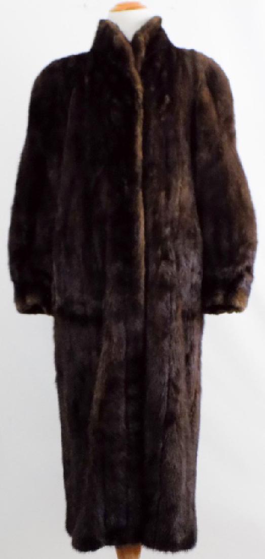 Vintage Mink Full Length Fur Coat: Vintage Mink Full Length Fur Coat. Brown mink with bemberg lining. Tag reads size 20. Measures 20 inches across the shoulders, 24 inches from shoulder to cuff, 49 inches total length.