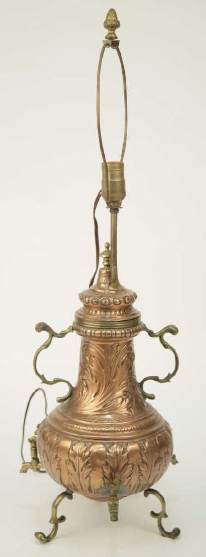 Antique Copper Samovar Table Lamp: Antique Copper Samovar Table Lamp. This antique copper samovar, having brass details, has been converted to a table lamp. 30 inches x 9 inches in diameter with harp.