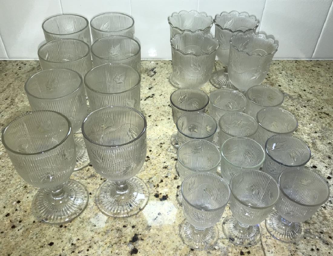 Group Antique Sandwich / Flint Glass Ivy Pattern: Group Antique Sandwich / Flint Glass Ivy Pattern. Glasses. Tallest measures 6 inches in height. Property of a Riverside Greenwich, CT estate.