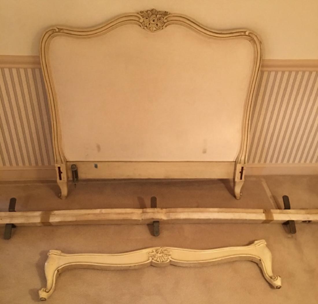 French Provincial Style Upholstered Headboard: French Provincial Style Upholstered Headboard. Having suede upholstery and carved floral details. 42 inches x 42 inches, rails measure 77 inches in length.