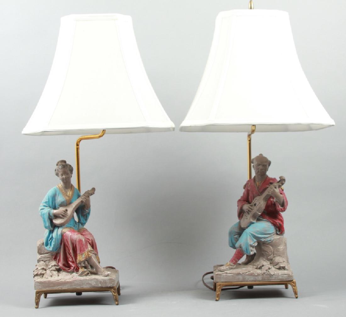 Pair of Chinoiserie Motif Statues Mounted as Lamps: Pair of Chinoiserie Motif Statues Mounted as Lamps. Each measures 27 inches in height. Property of a Wilton, Connecticut estate.