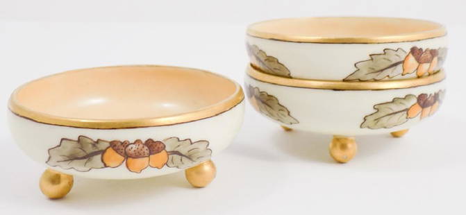 3 MZ (Moritz Zdekauer) Austria Condiment Dishes: Three MZ (Moritz Zdekauer) Austria Condiment Dishes. Hand painted with acorn and oak tree leaves. Gold leaf trim and feet. No chips. 1 inch by 3 inches in diameter.