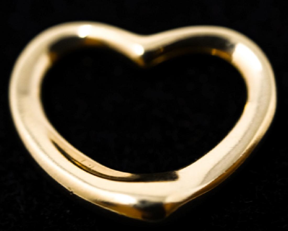 Tiffany & Co 18kt Yellow Gold Elsa Peretti Heart: Tiffany & Co 18kt Yellow Gold Elsa Peretti Heart. Signed and hallmarked on back heart form necklace pendant. Measures 7/8 of an inch in width.