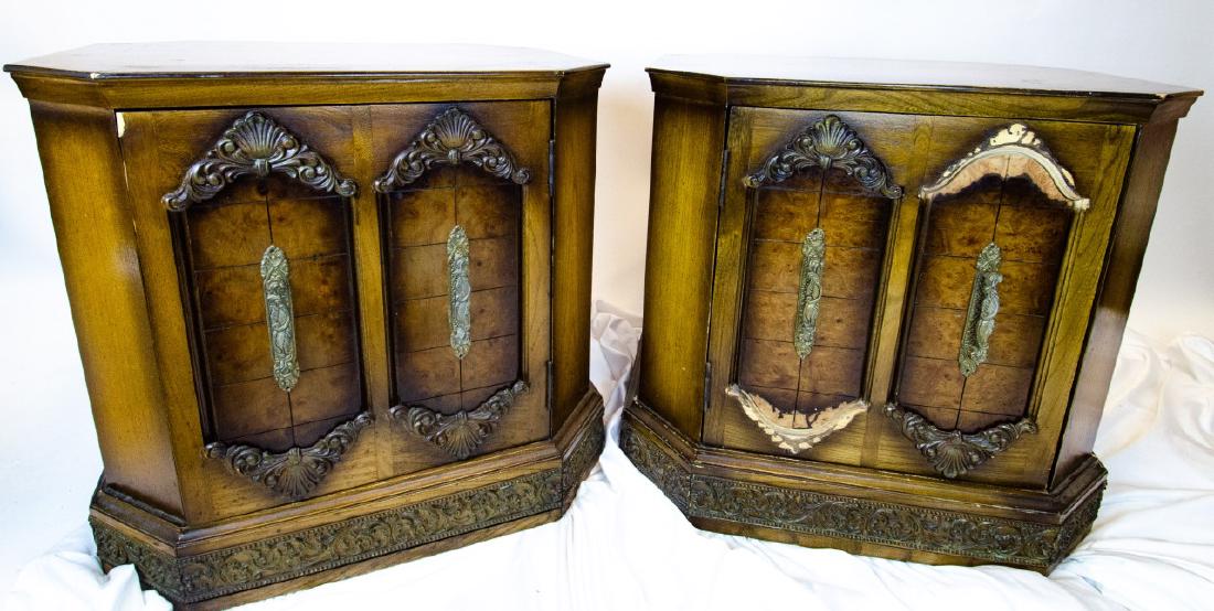 Neoclassical Style Burled Wood Veneer Nightstands: Pair Neoclassical Style Burled Wood Veneer Nightstands. Having burled wood, carved and brass details. Each measures approximately 23 inches x 24 inches x 20 inches.