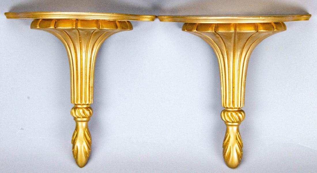 Pair Hollywood Regency Gilt Wood Wall Brackets: Pair Hollywood Regency Gilt Wood Wall Brackets. Each measures 10 x 10 x 5 inches.