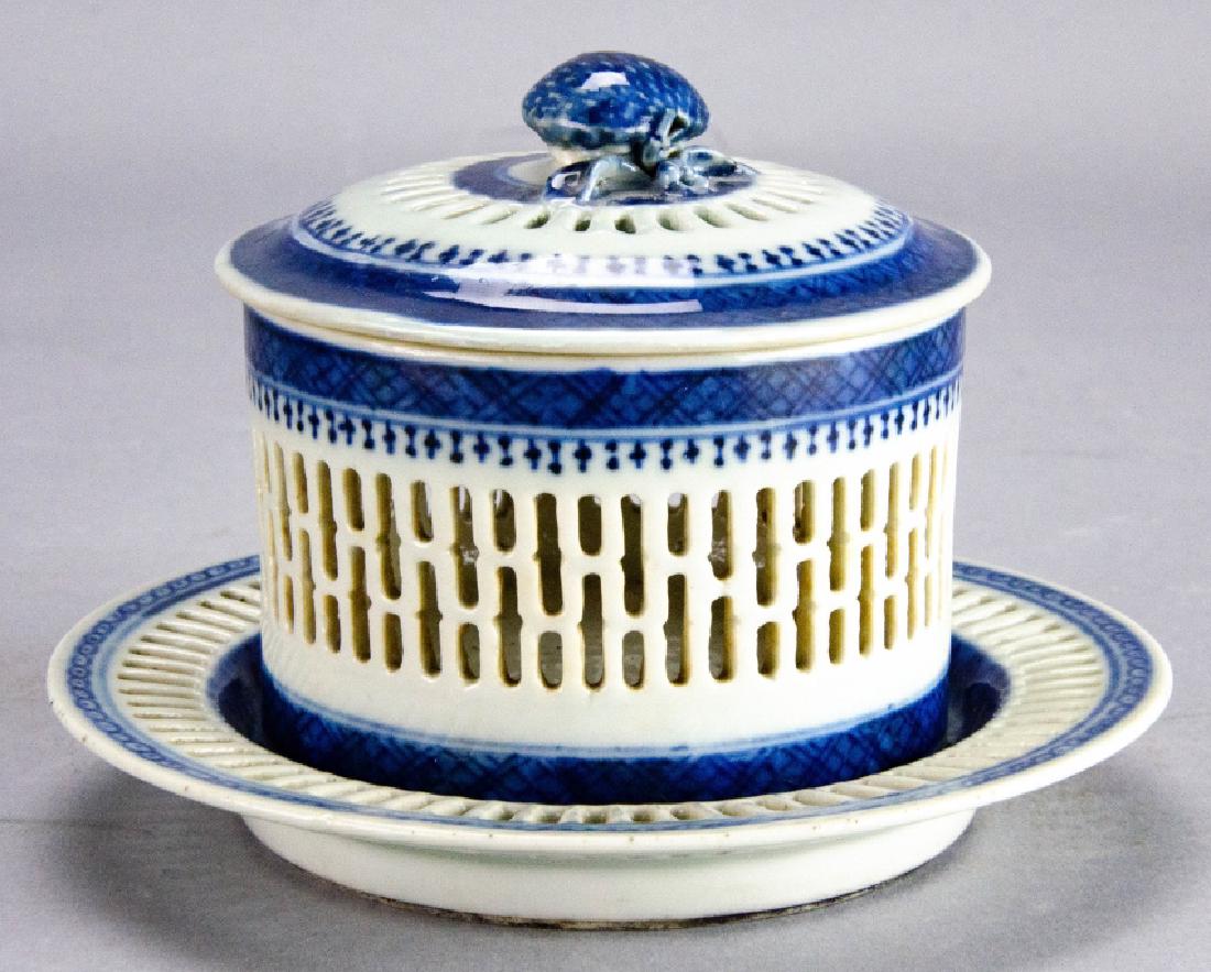 Antique 19th C Chinese Porcelain Incense Burner: Antique 19th C Chinese Porcelain Incense Burner. This antique 19th century Chinese blue and white porcelain reticulated incense burner features a figural handle and floral motif on the under plate. Li