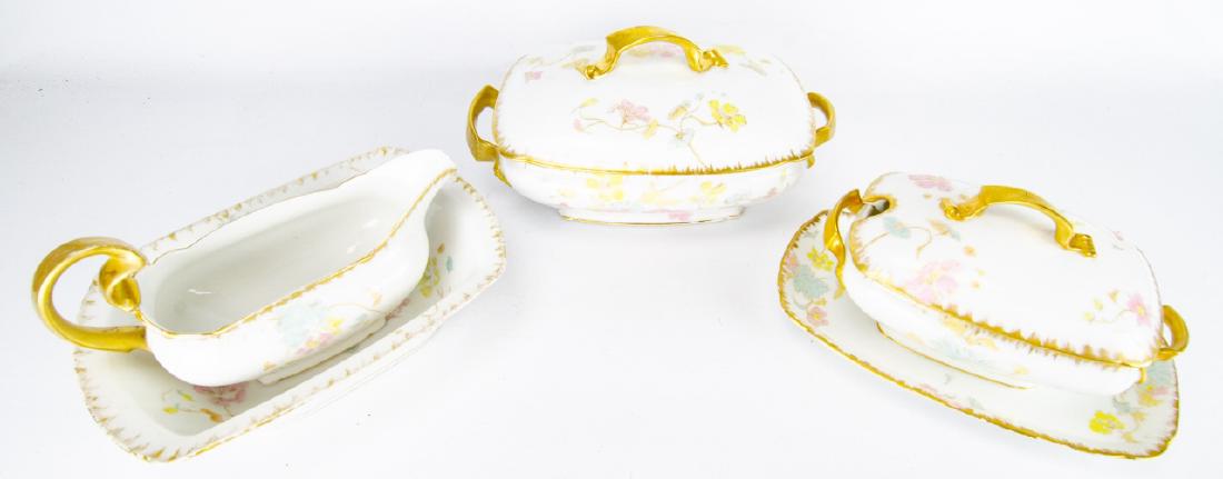 Antique D & C Limoges French Porcelain Serveware: Antique D & C Limoges French Porcelain Serveware Pieces. This lot features three pieces of antique D & C Limoges porcelain serveware, including two lidded tureens and one serving dish. Largest tureen 