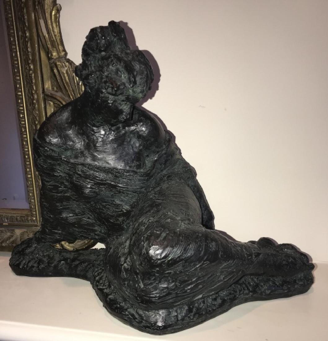 Faux Bronze Statue of a Reclining Woman: Faux Bronze Statue of a Reclining Woman. Measures 12 inches in height. Property of a Larchmont, New York estate.