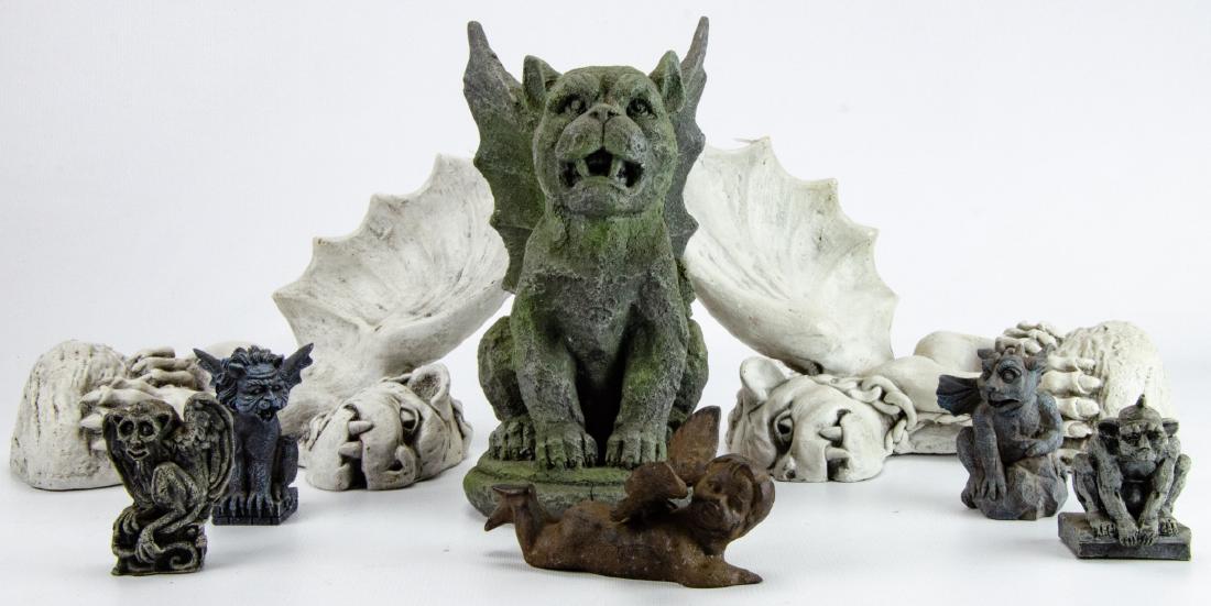 Collection of Figural Gothic Gargoyle Statues: Collection of Figural Gothic Gargoyle Statues. Includes five figural gargoyle statues, a pair of figural gargoyle wall mounts, and one angel / putti cast iron figurine. Largest statue measures 9.5 inc