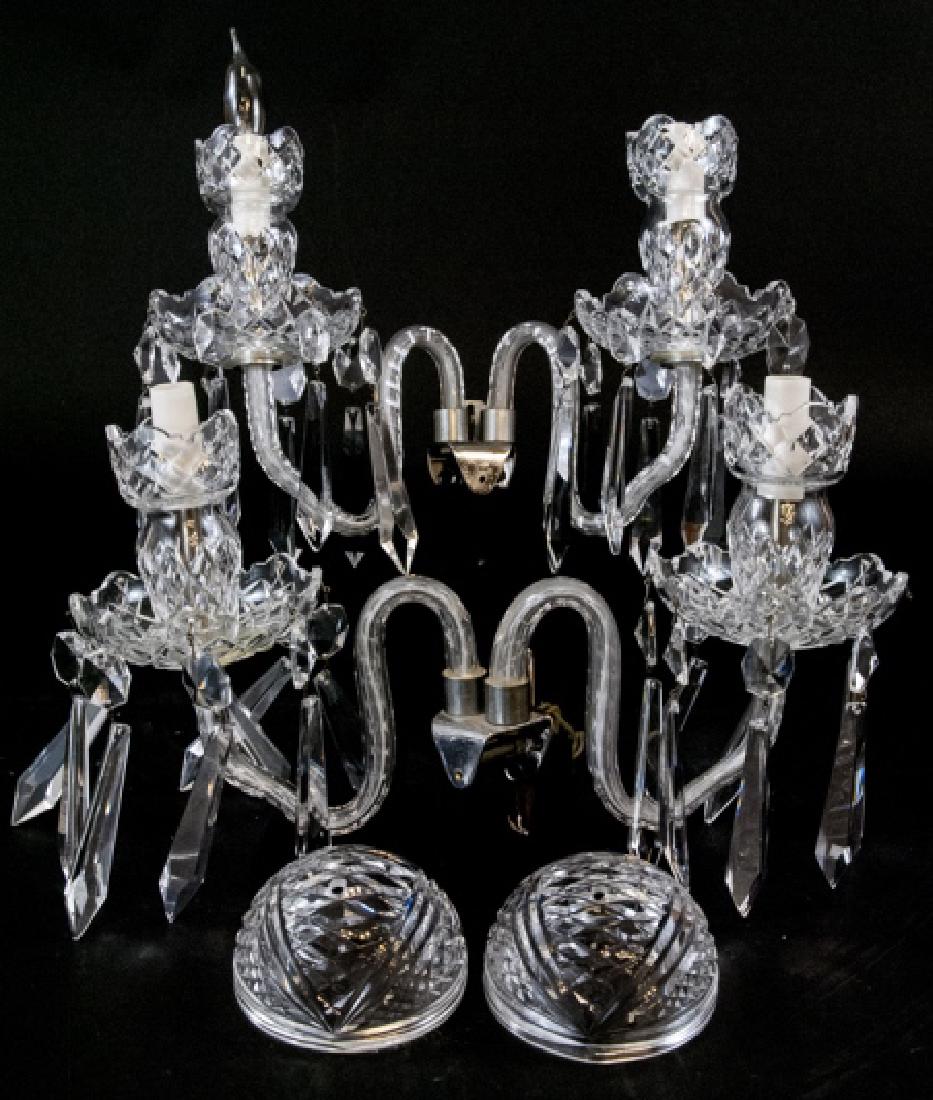 Pair of Waterford Avoca Double Arm Wall Sconces: Pair of Waterford Avoca Double Arm Wall Sconces. Cut crystal and bohemian glass Waterford wall sconces. Each element and pendalog is marked Waterford. One sconce has been repaired. 10 inches x 11 inch